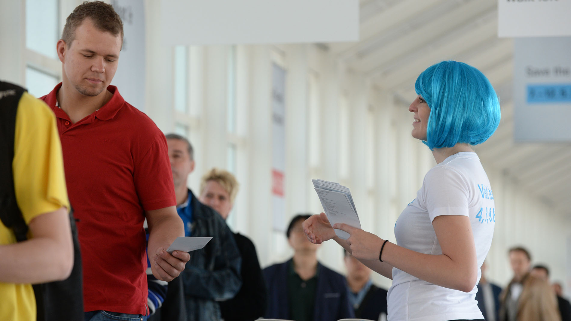 Promotion: Hostess distributes flyers at Messe Frankfurt